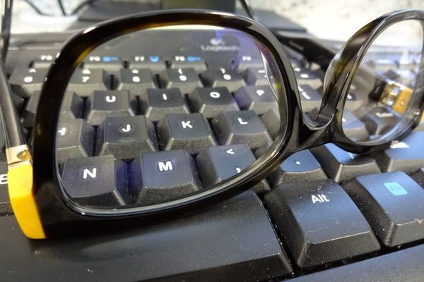 eyeglasses on a keyboard