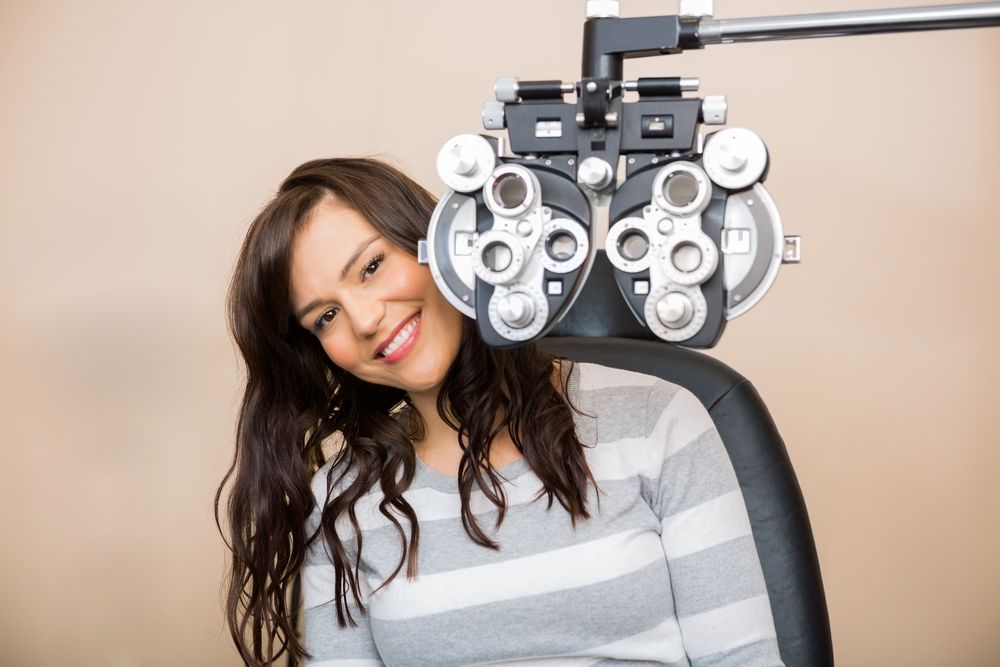 female eye patient smiling