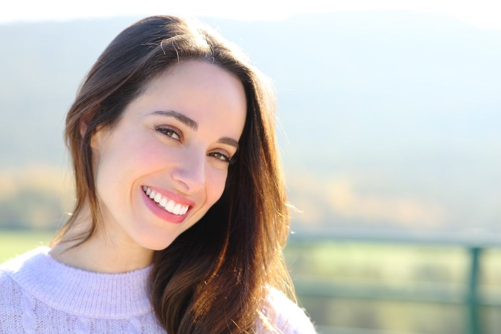 Headshot of a woman outside