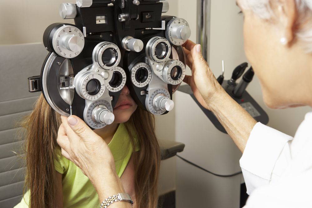 girl having eye check up