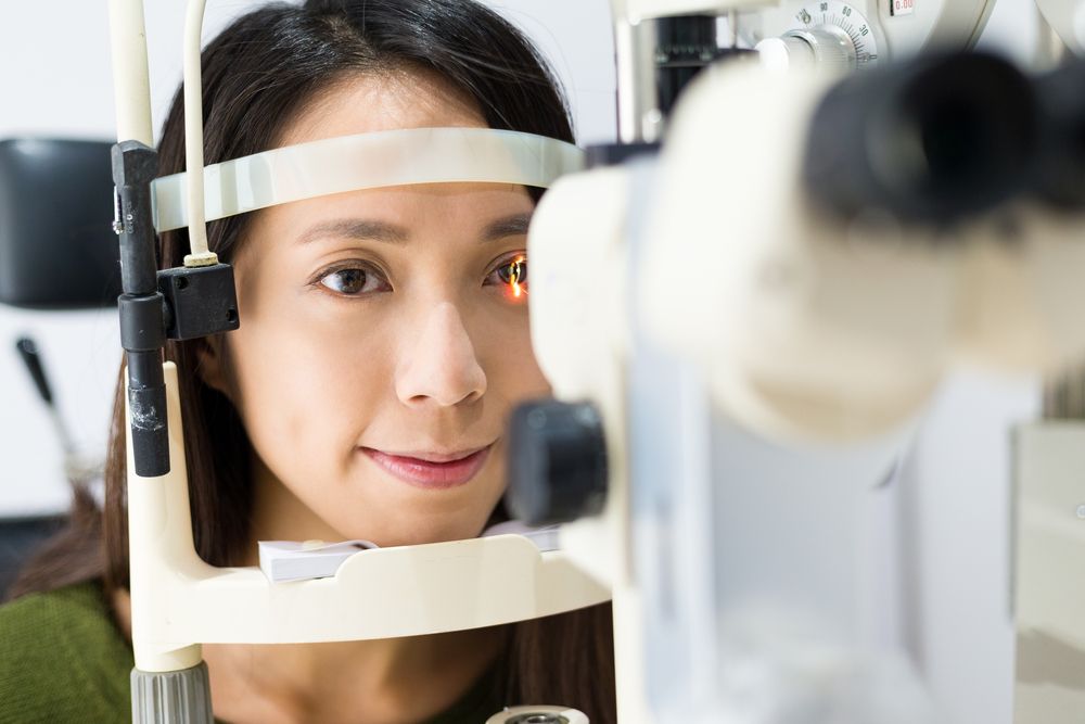 patient getting her eye checked