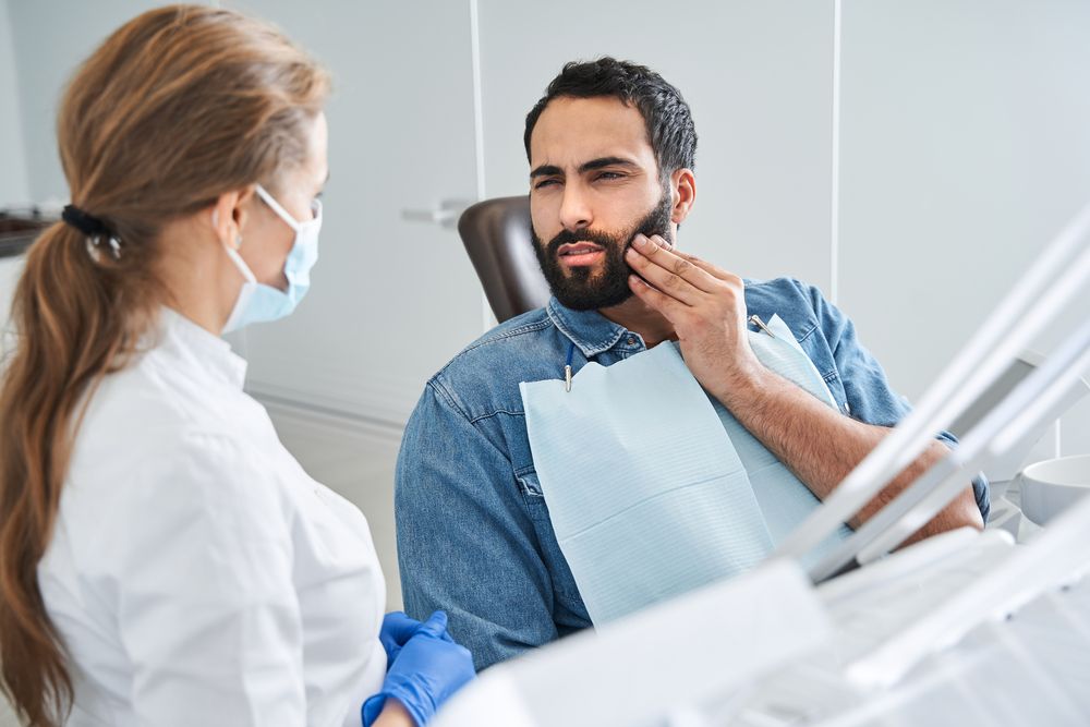 man having toothache