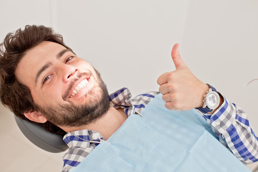 happy patient in a dental clinic