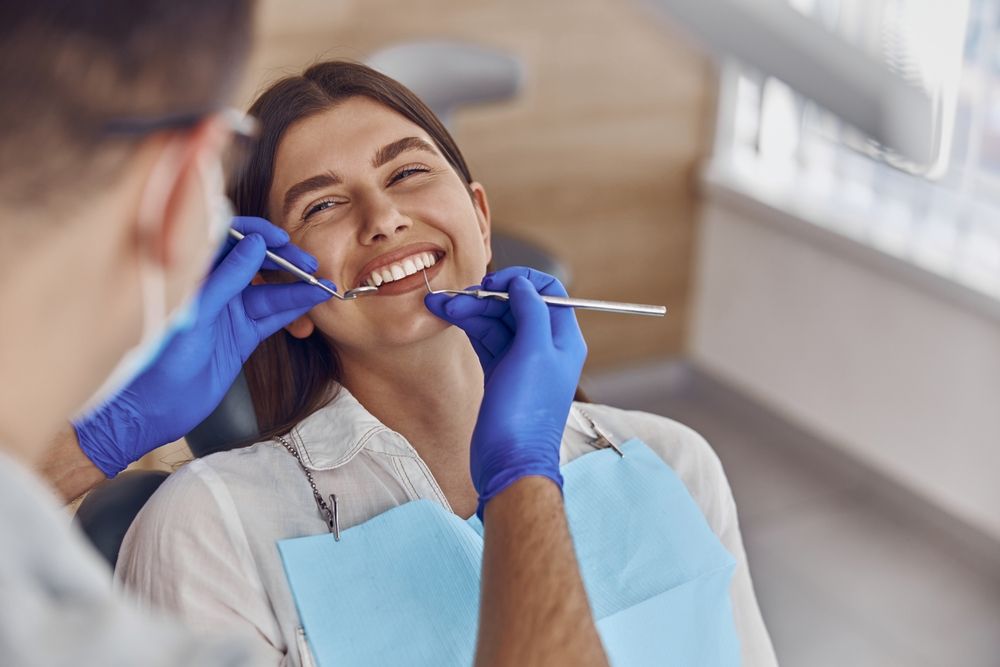 woman at the dentist getting dental fillings​​​​​​​