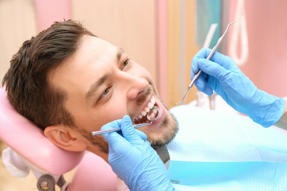 happy patient in a dental clinic​​​​​​​