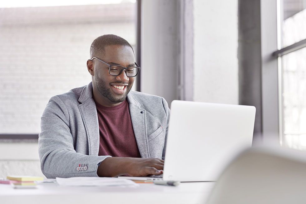 man on his computer