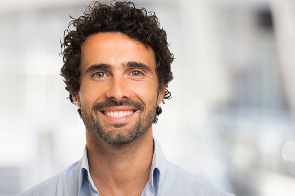 bearded man smiling