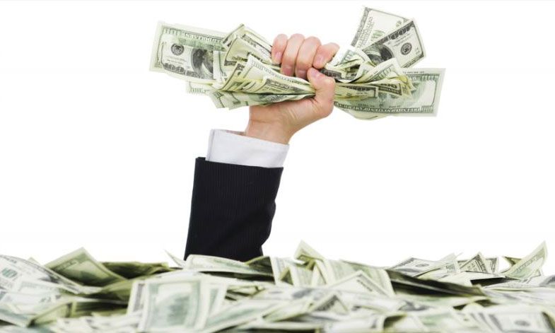 man holding dollar bills