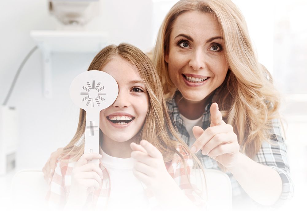 mother and daughter at the optometrist