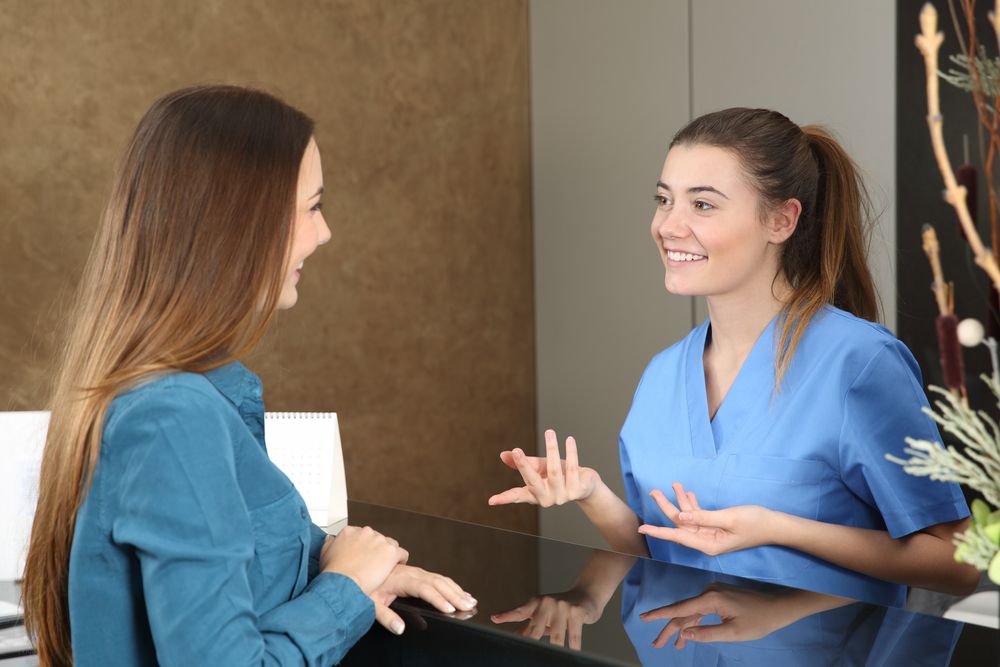 dentist explaining to patient