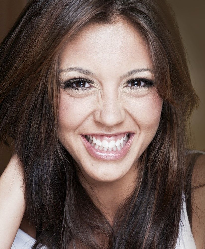 brown haired woman smiling