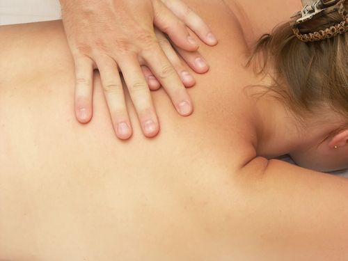 Woman getting back massage