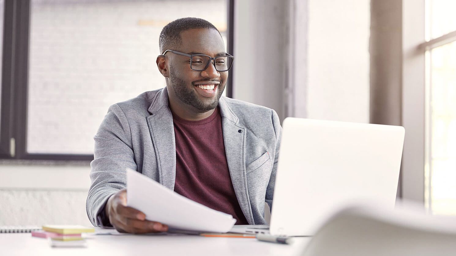 Man browsing on his Laptop