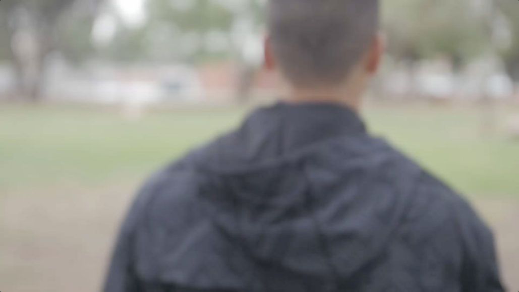Blurred image of a man with hoodie