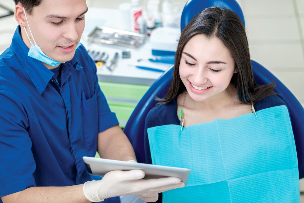 woman with dentist