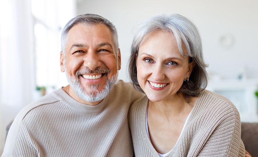 man and woman smiling 