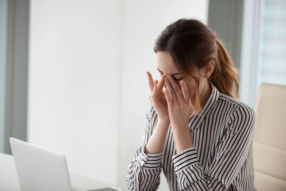 What are the causes of Dry Eye?