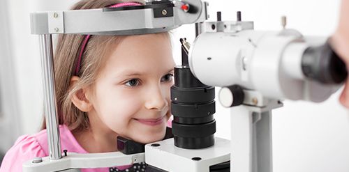 What is the difference between a pediatric vision screening and a comprehensive eye exam?