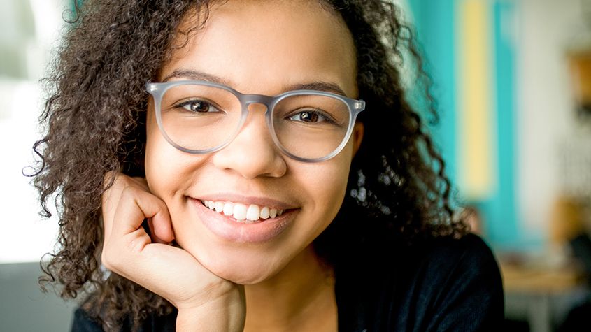 Young girl wearing eyeglasses