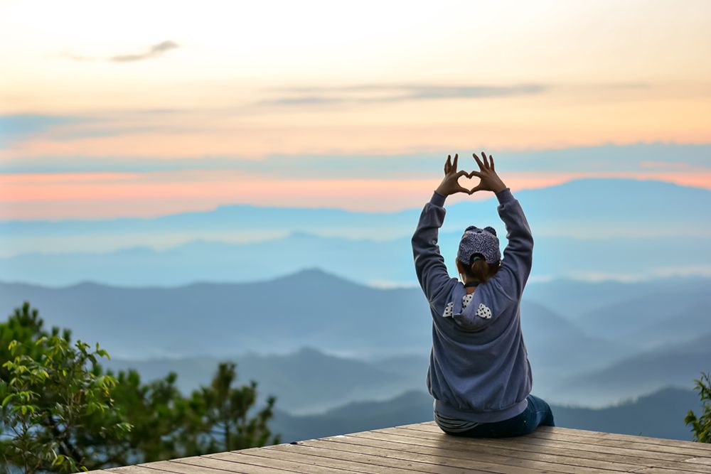 Heart hand sign