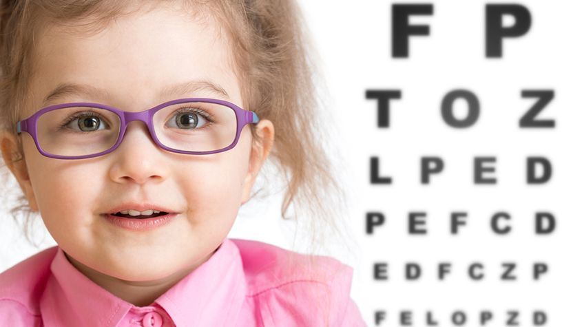 Little girl having an eye check-up