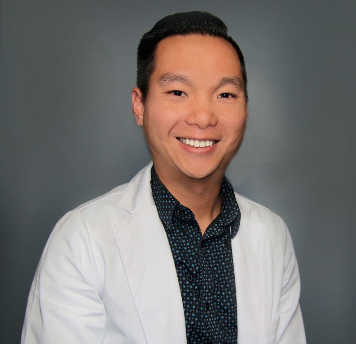 Dr. Christopher Tom