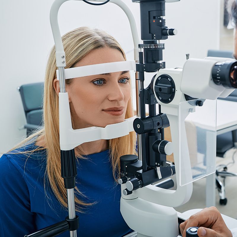 Eye doctor with patient