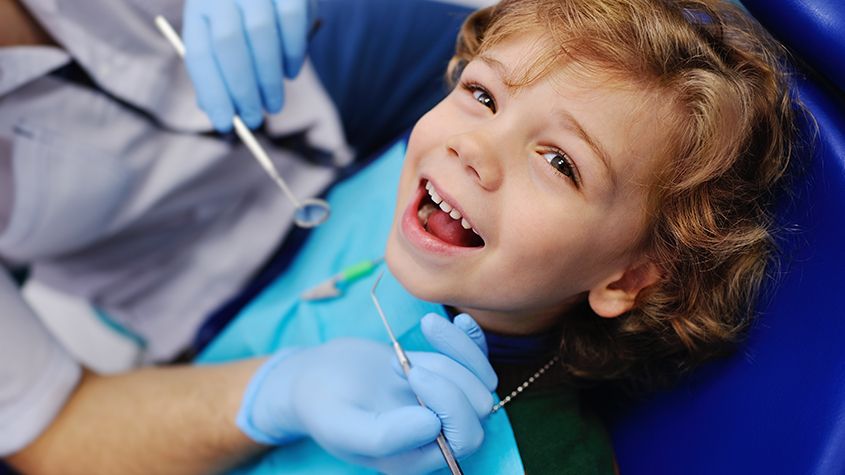 Boy having dental examination