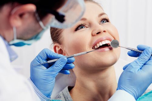 happy lady in a dental clinic