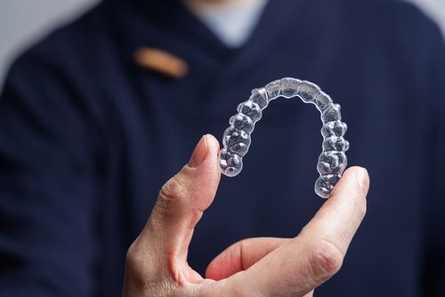 Invisalign and Bruxism: Managing Teeth Grinding with Clear Aligners
