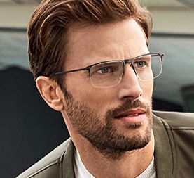 man wearing cutier and gross glasses 