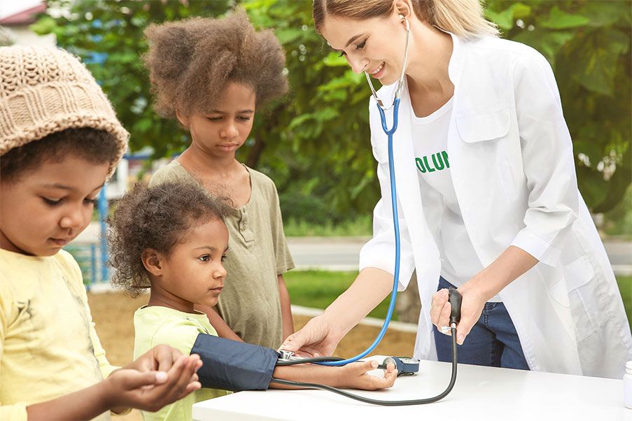 doctor with children