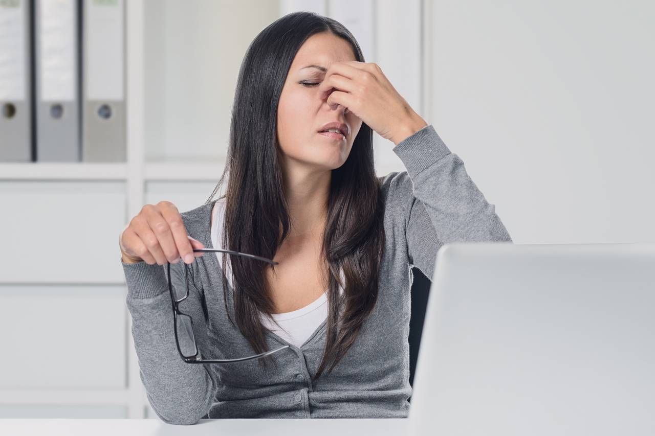 Women Suffering Eyestrain