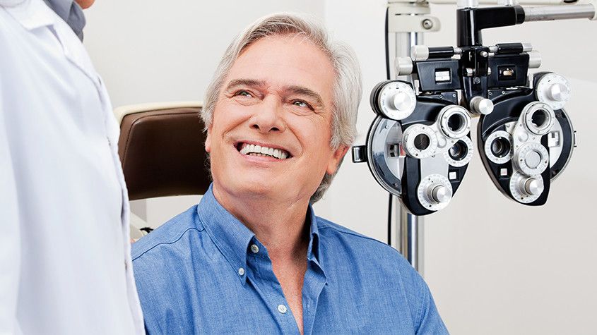 optometrist with patient