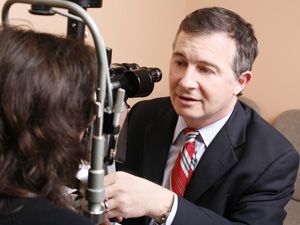 eye doctor with patient