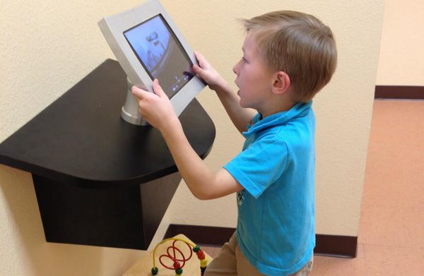 kid interacting with digital technology