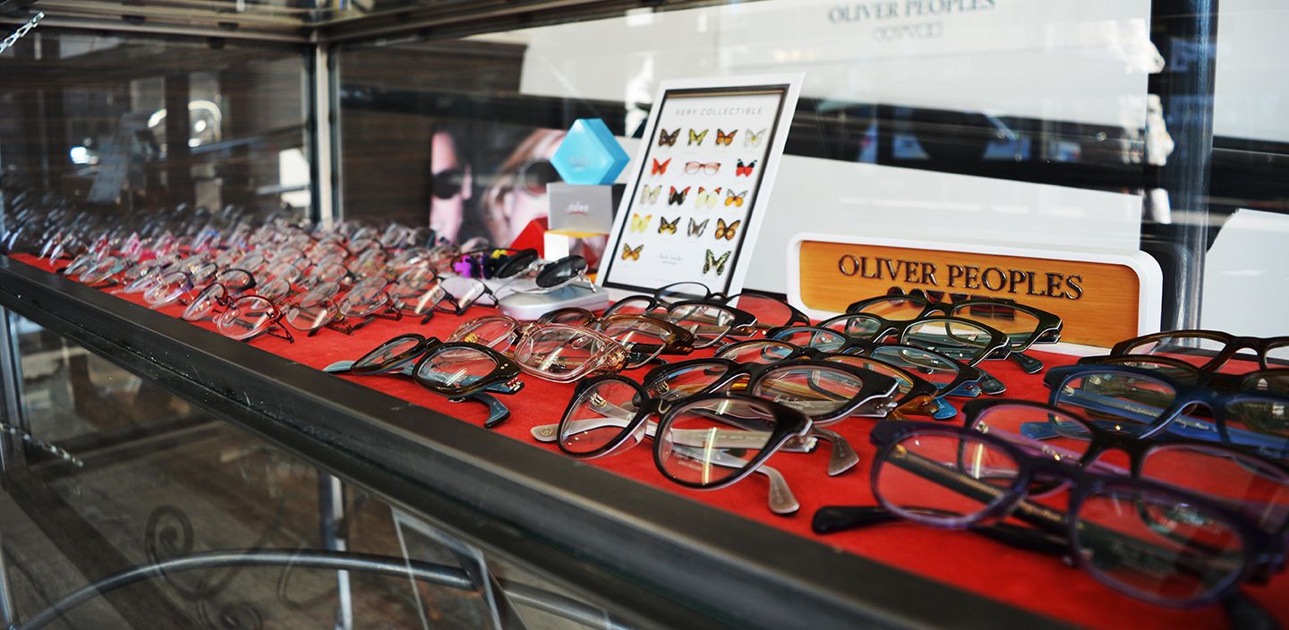 Many sun glasses in the red table