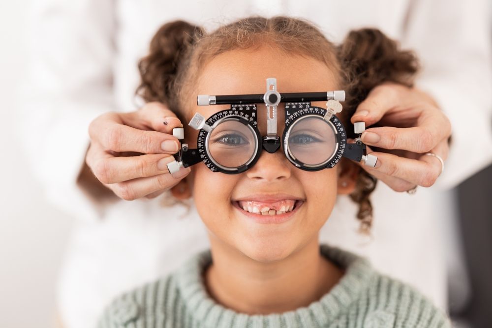 young girl at an eye exam