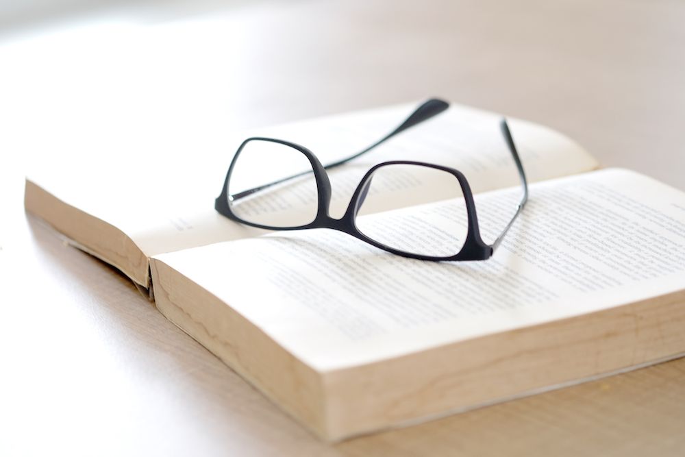 glasses on a book