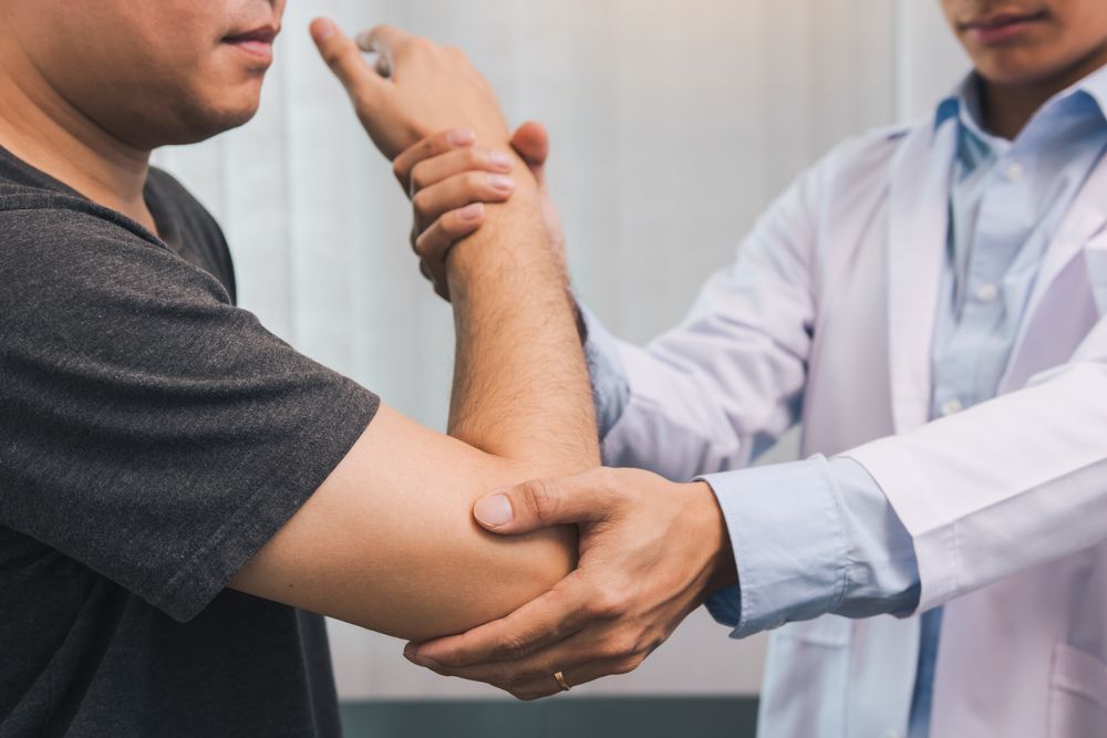 Common Causes and Chiropractic Solutions for Elbow Pain