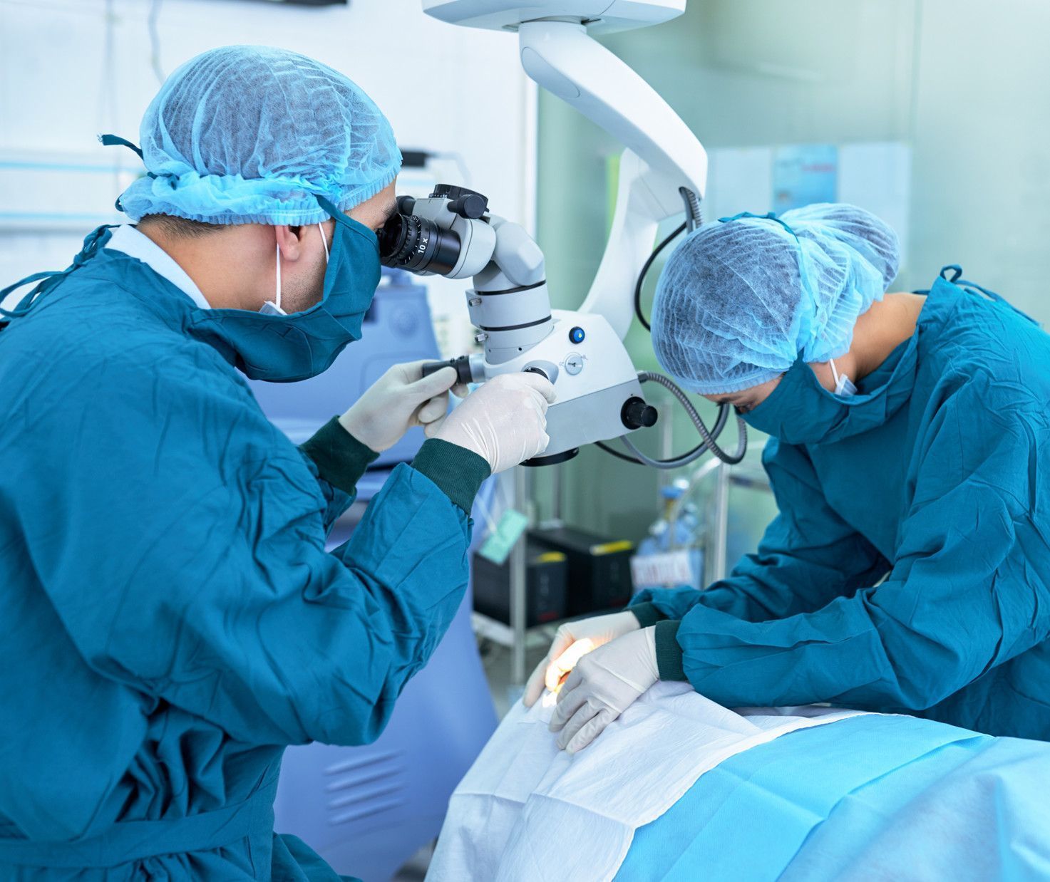 Eye doctors performing a procedure for a patient | Focus Eye Care, P.C.