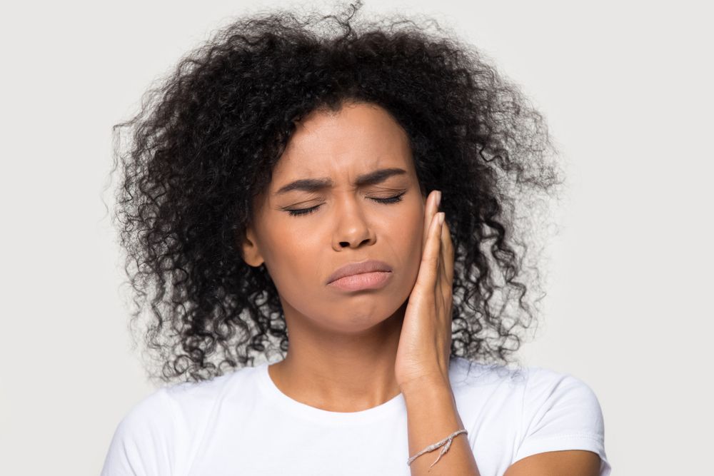 Is Your Jaw Clicking? How to Identify the Signs and Symptoms of TMJ Pain