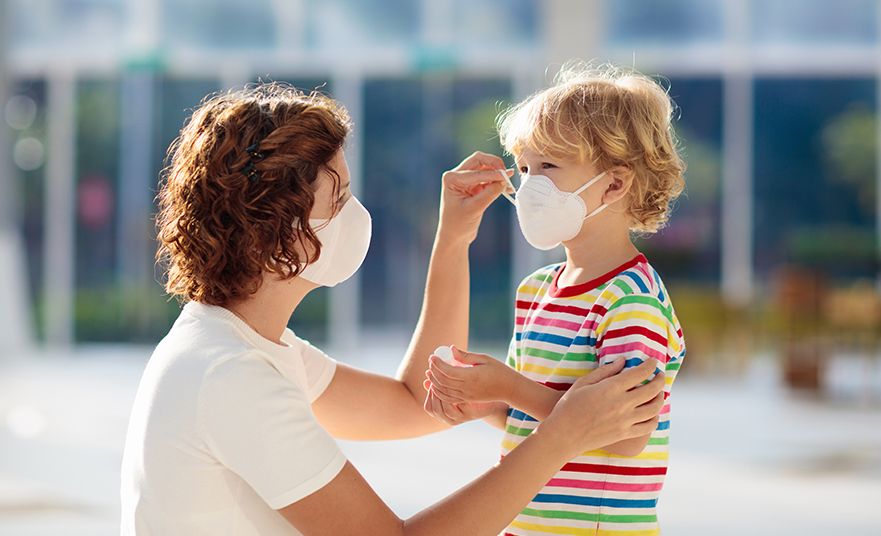 Family with kids in face mask