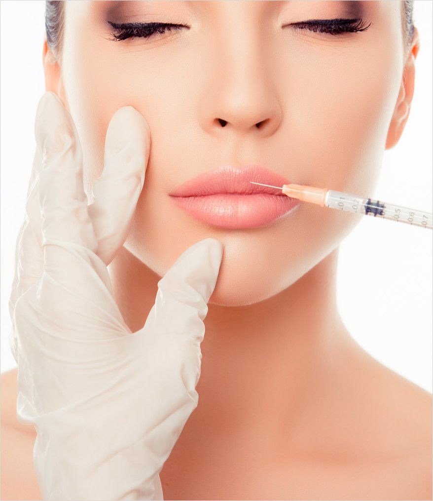 woman's lips enhanced by the plastic surgeon