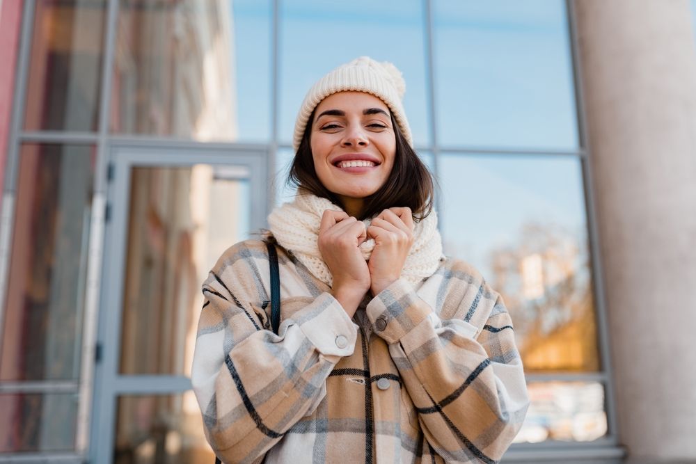 woman smiling in the winter time