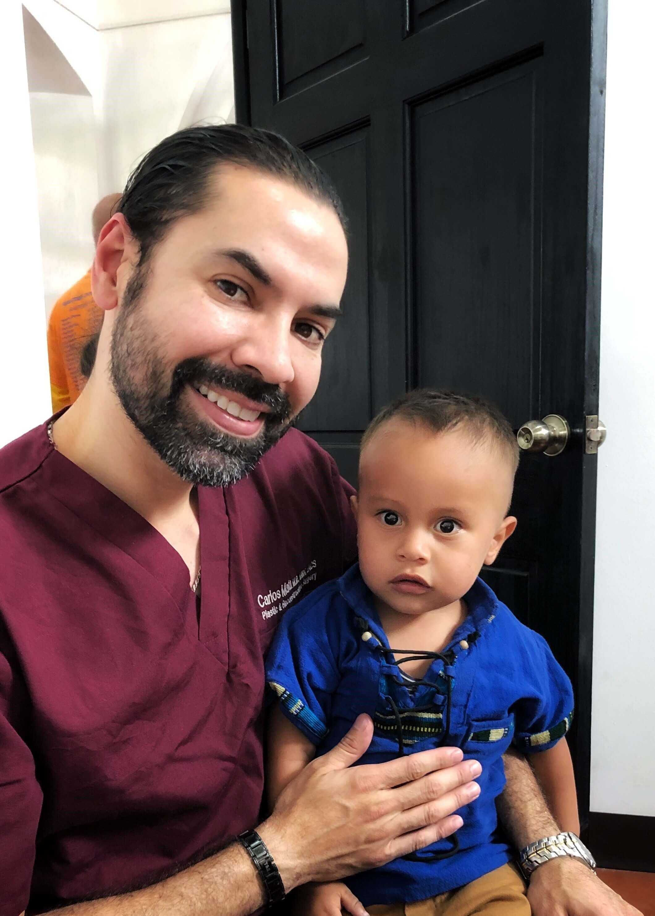 Dr. Mata doing volunteer work