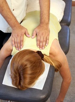 woman getting a chiropractic adjustment