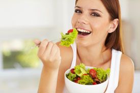 woman eating a salad