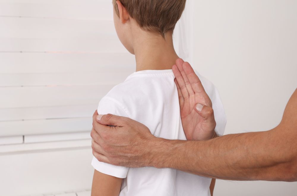 How Chiropractic Adjustments Can Help Your Child with Growing Pains