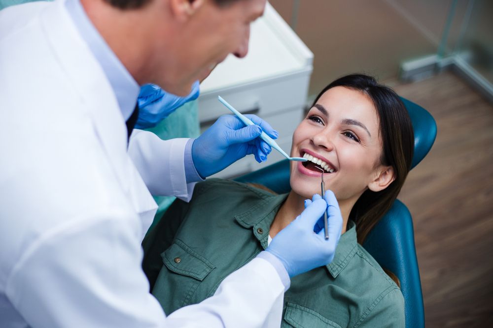 smiling patient dentist